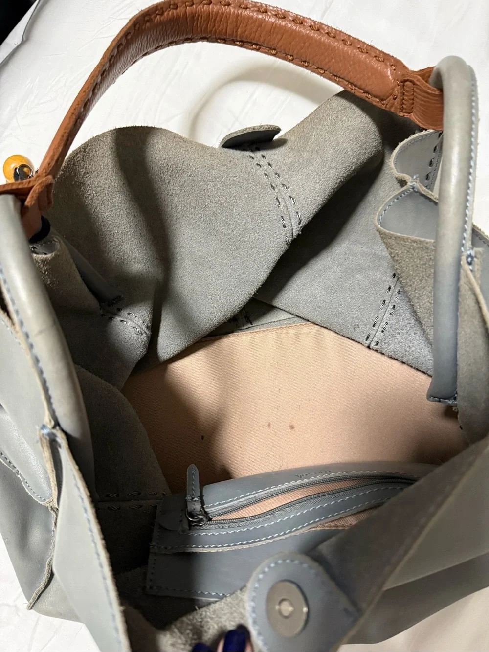 The Sak Gray Leather Hobo Shoulder Bag with Brown Strap and Tassels